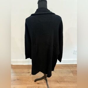 Medium black cardigan new condition.